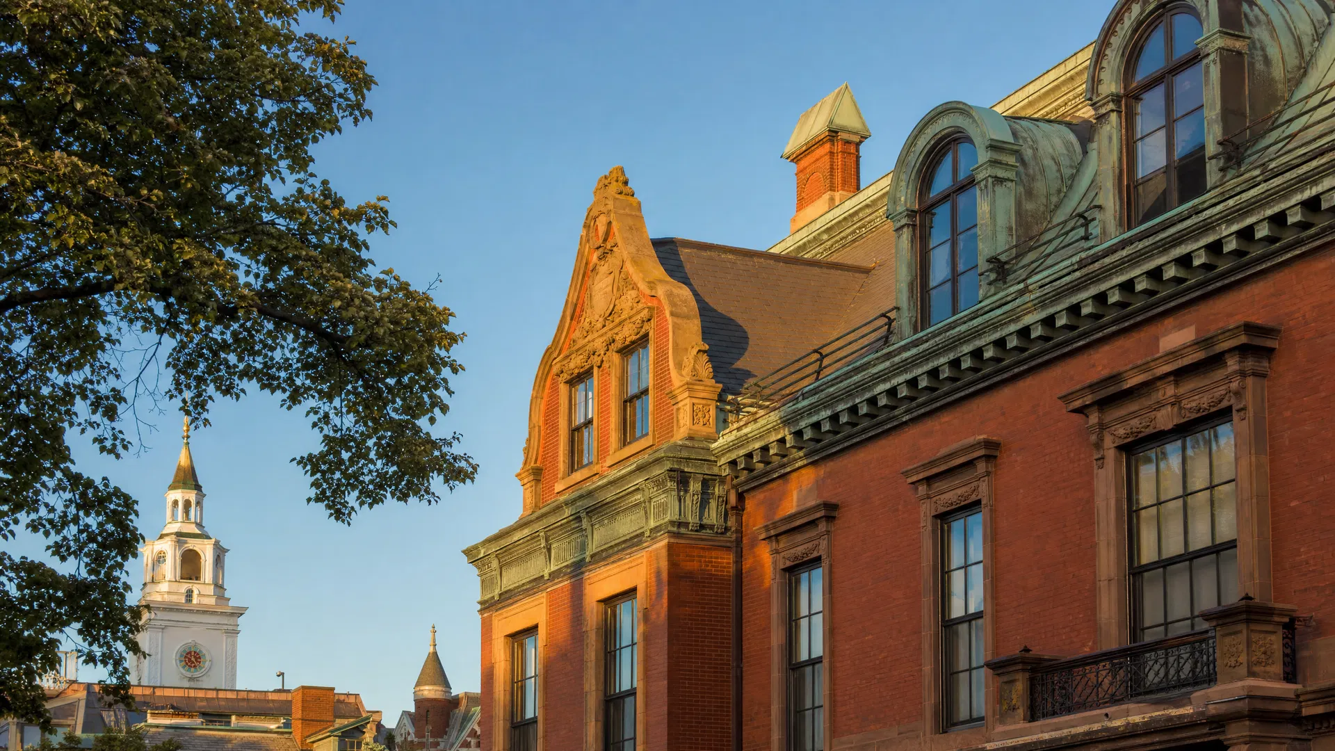 Historic Harvard Square area building with copper roof details in Cambridge MA