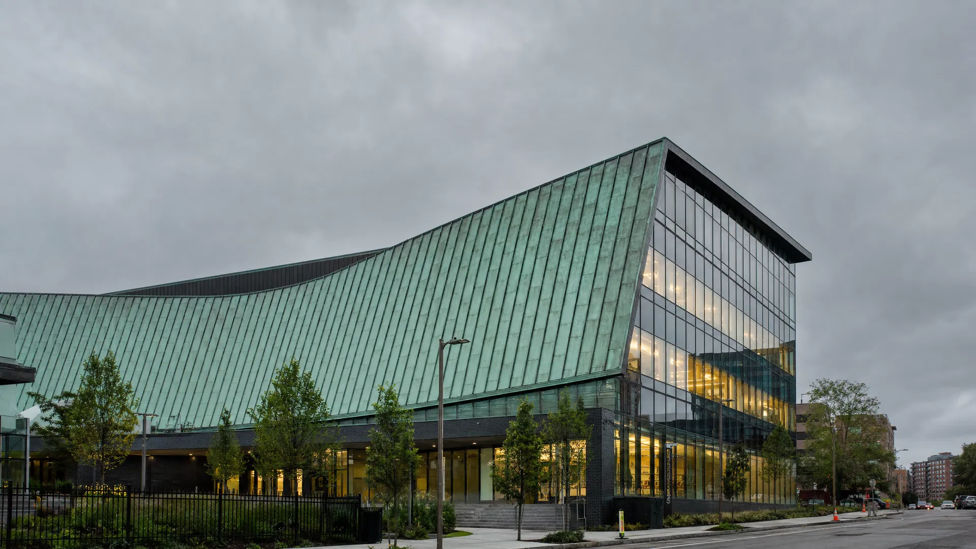 Modern commercial building in Boston with sweeping copper roof