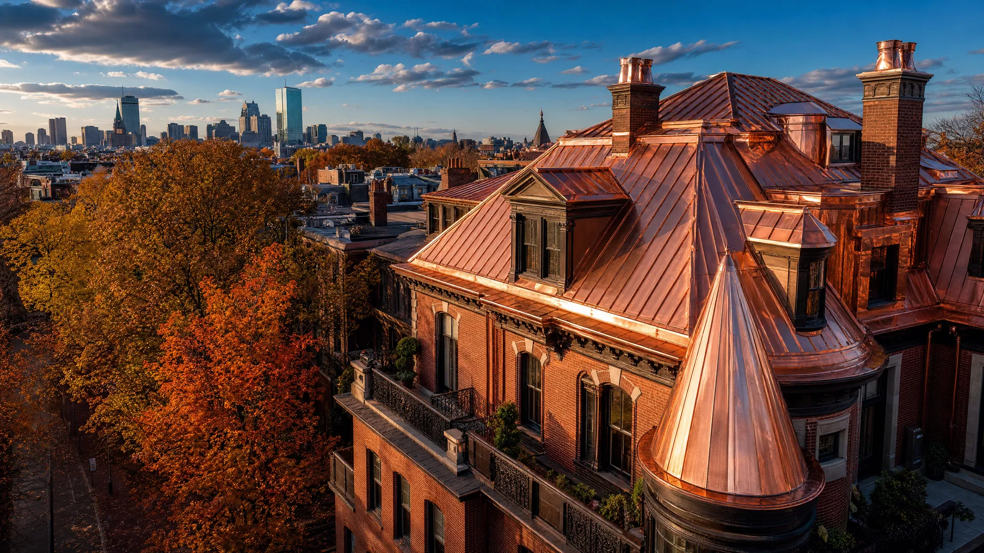 Gleaming copper roof on a Beacon Hill brownstone with the Boston skyline in the background