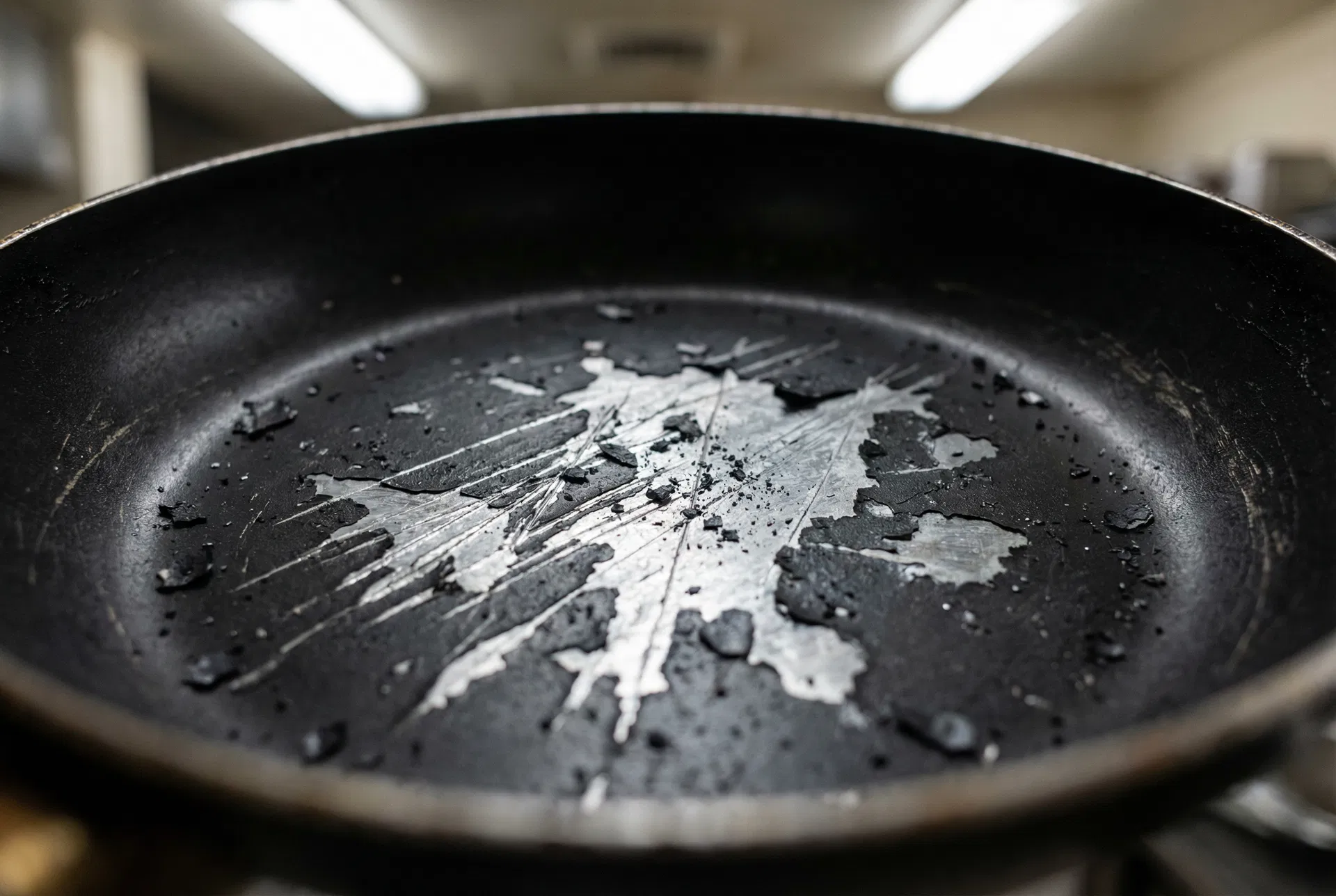 Scratched non-stick pan releasing chemicals