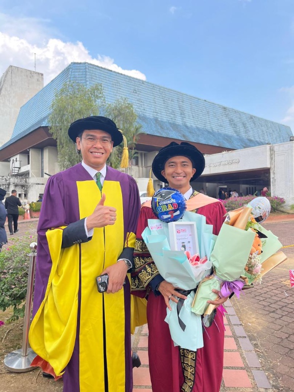 Celebrating Our New PhD Graduate!