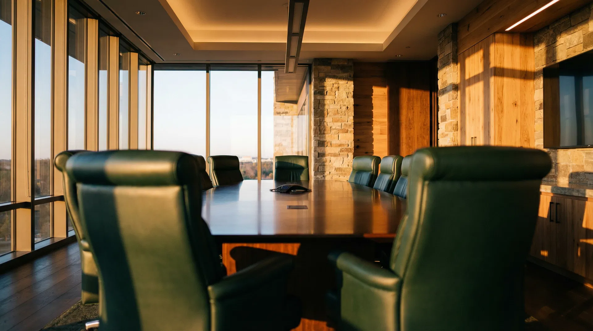 Modern boardroom with warm lighting — AQL Partners leadership development