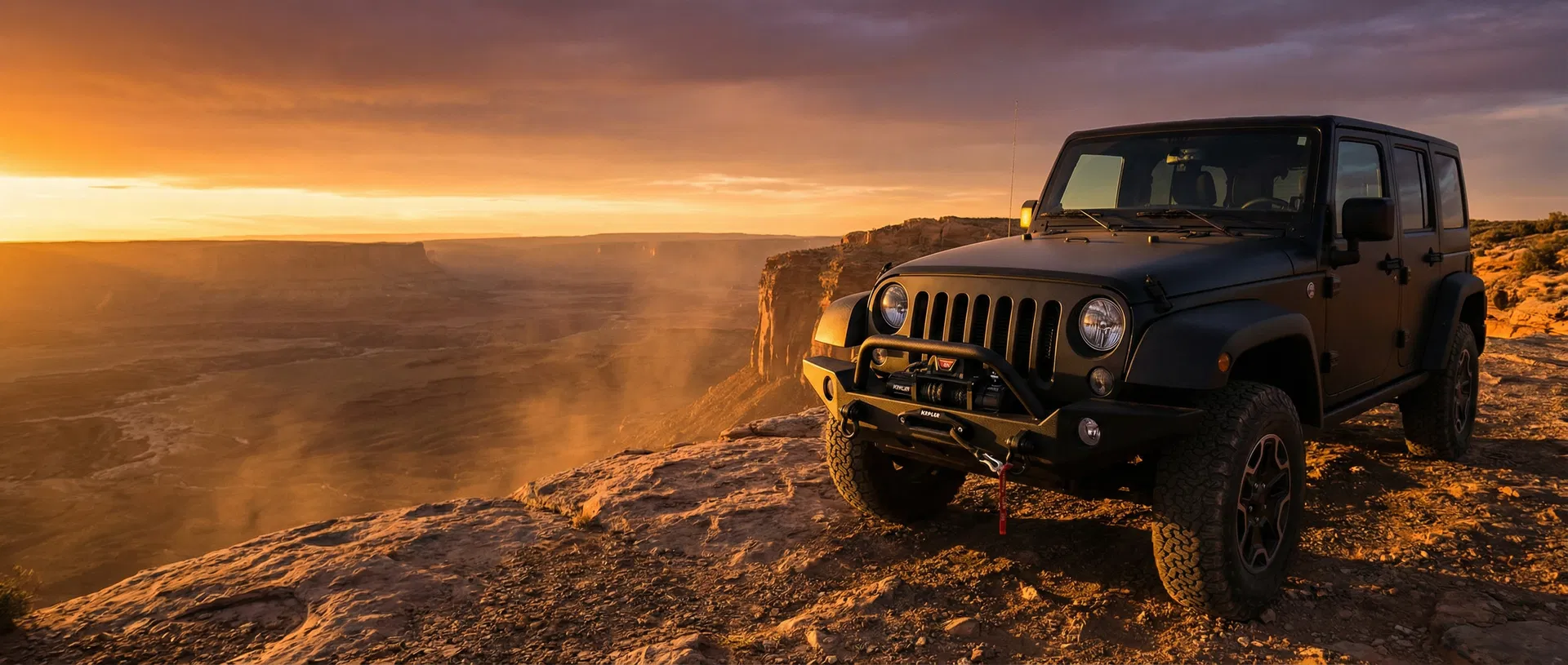 Kepler electric winch mounted on a Jeep Wrangler in dramatic off-road terrain