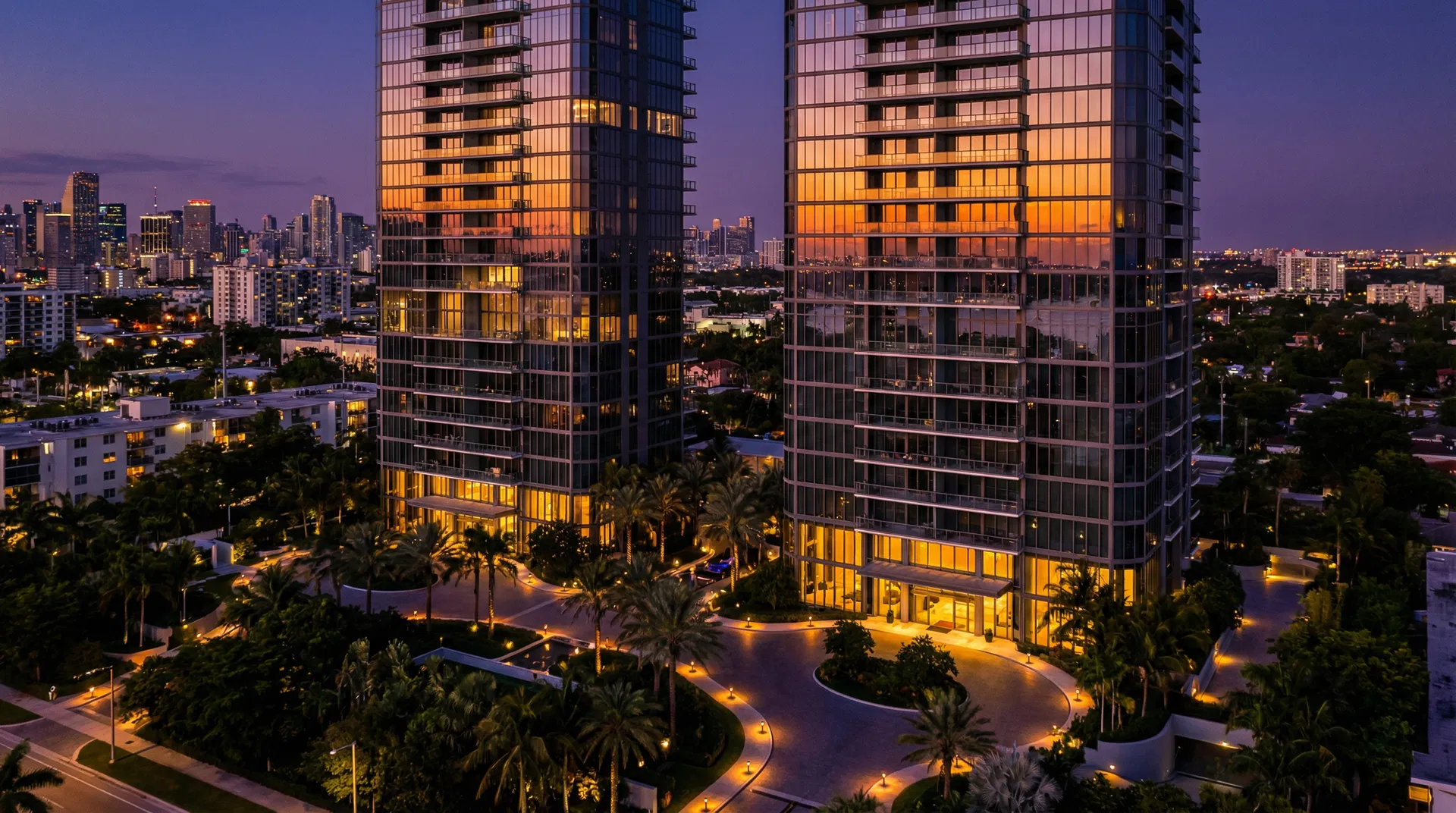 M Grand Minori twin towers at twilight with golden illumination