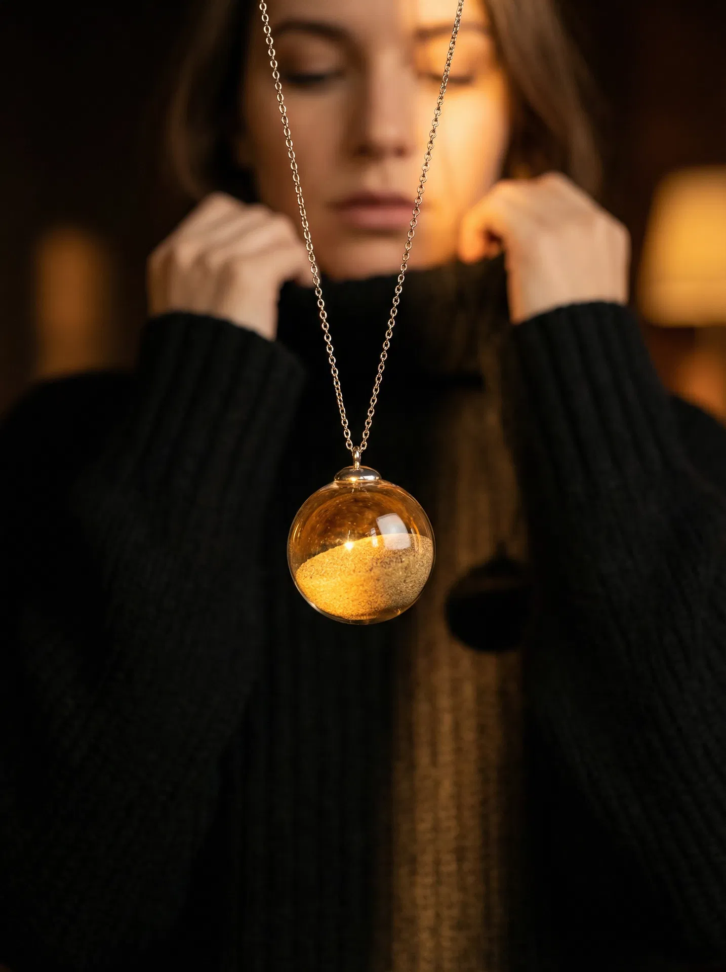 The Grounding Stone pendant worn as a necklace