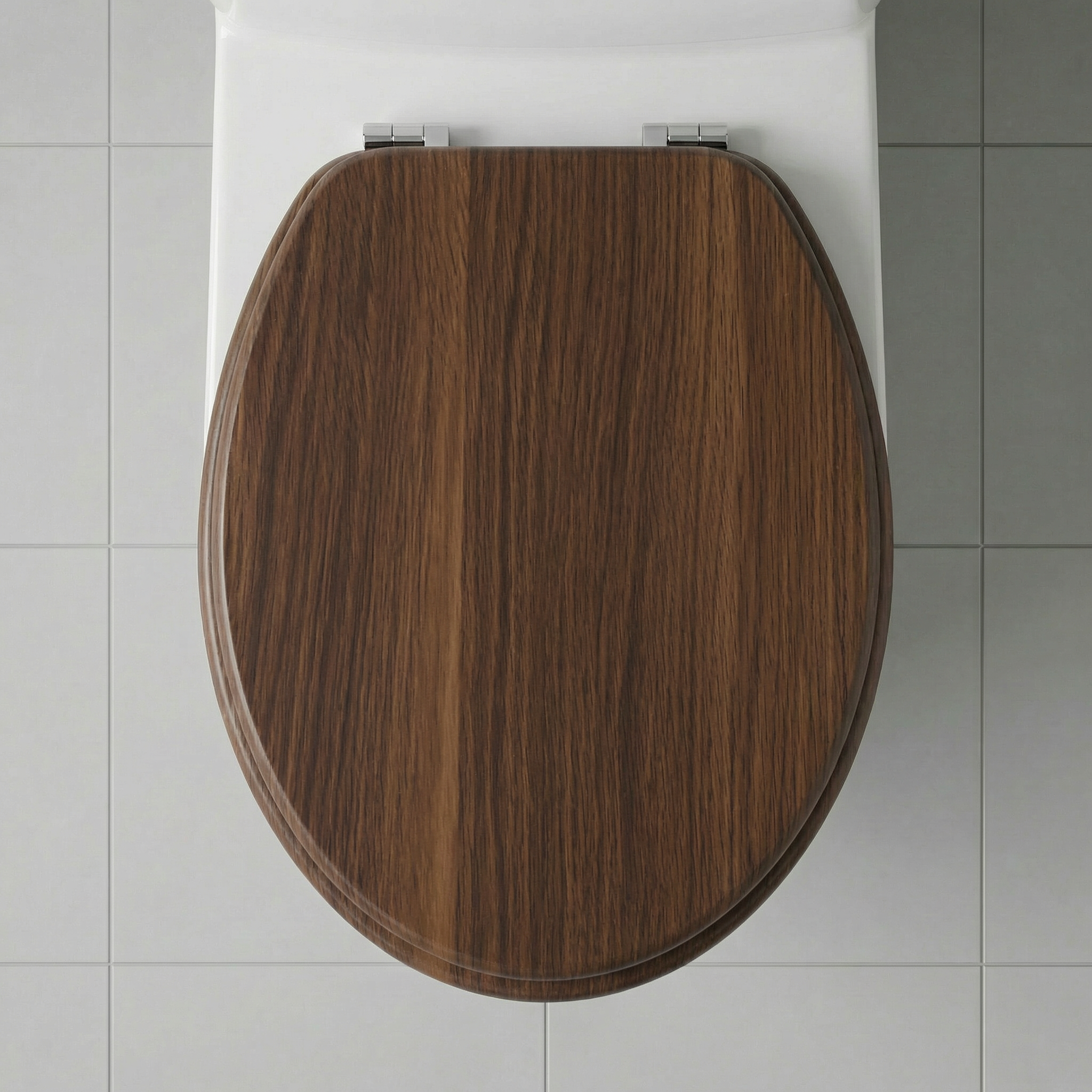 Detailansicht eines Toilettensitz-Scharniers mit Befestigungsmaterial