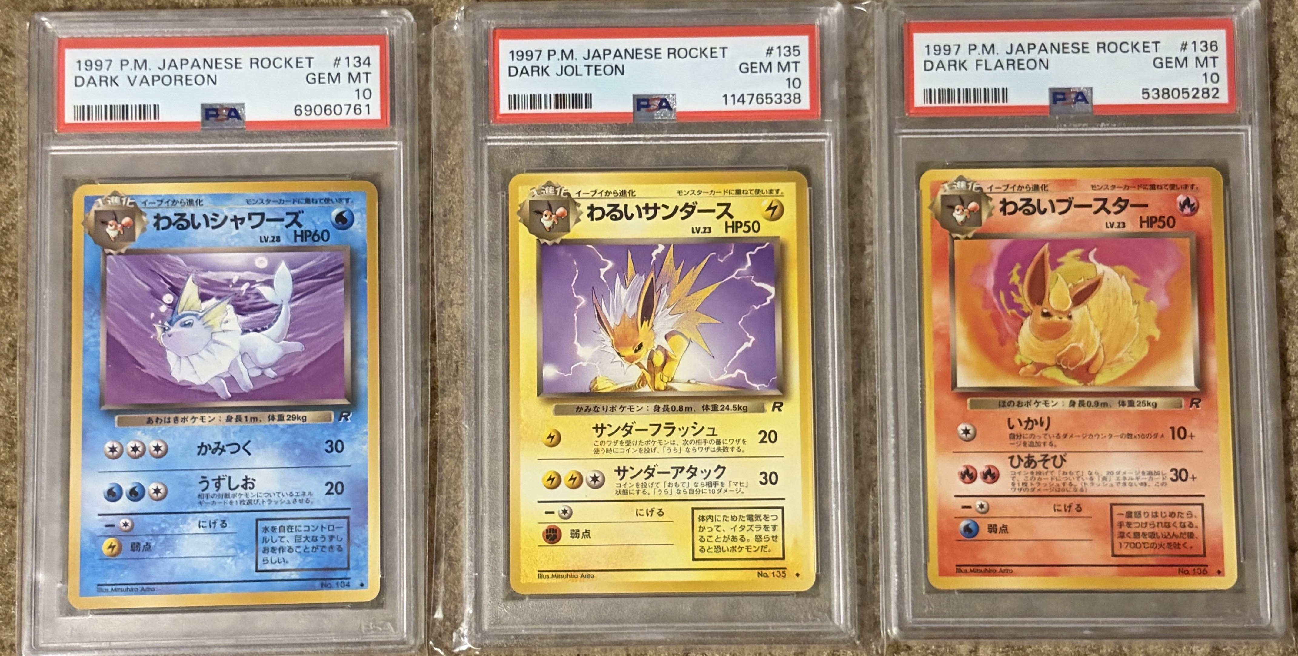 1997 POKEMON JAPANESE ROCKET #135 DARK VAPOREON/JOLTEON/FLAREON Trio - Front