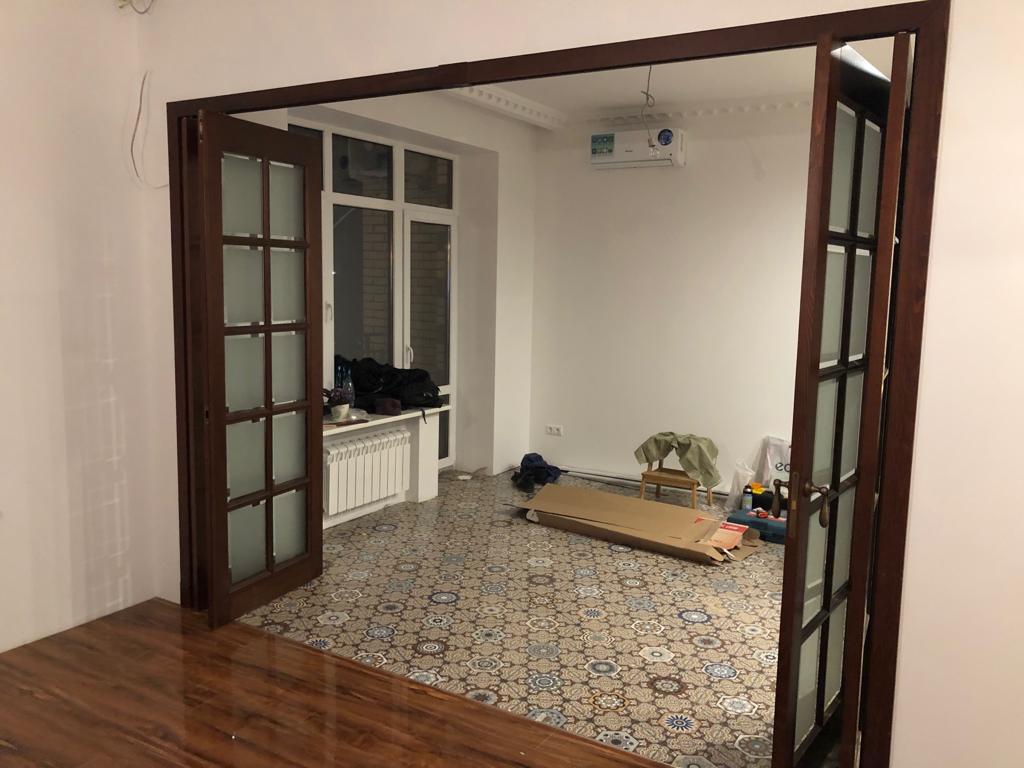 Двойные деревянные двери-купе