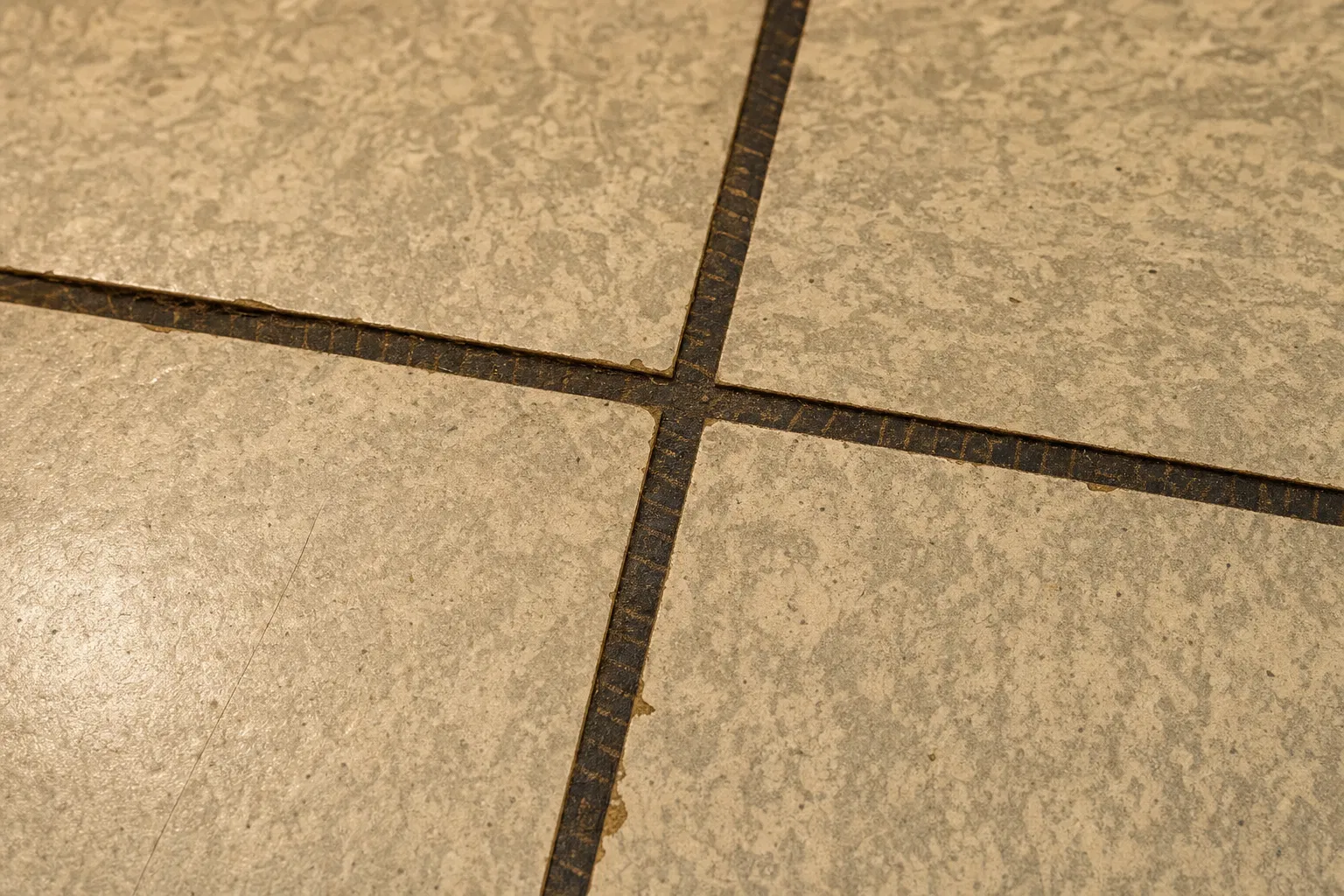 Asbestos floor tile removal in Southeast Michigan — 9x9 and 12x12 vinyl asbestos tile