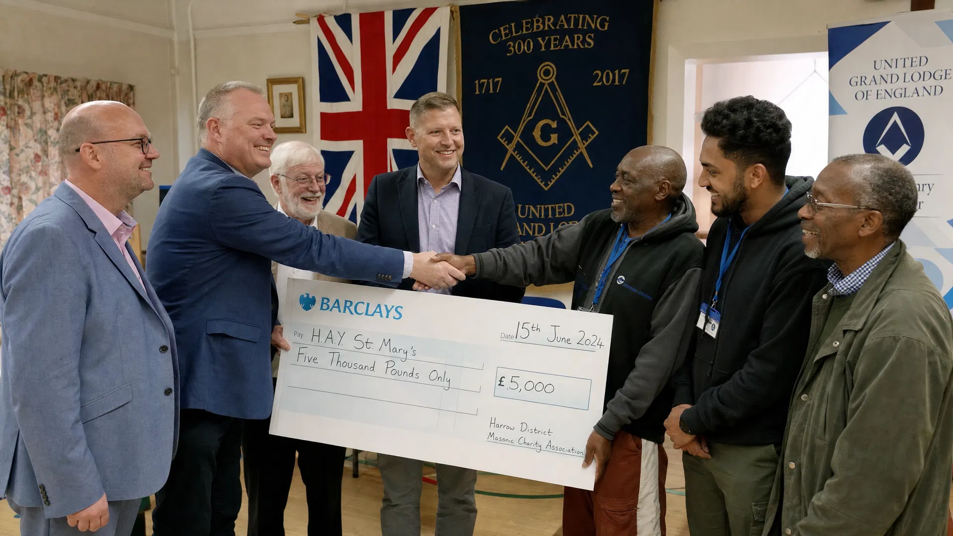 Peace Lodge presenting charity cheque