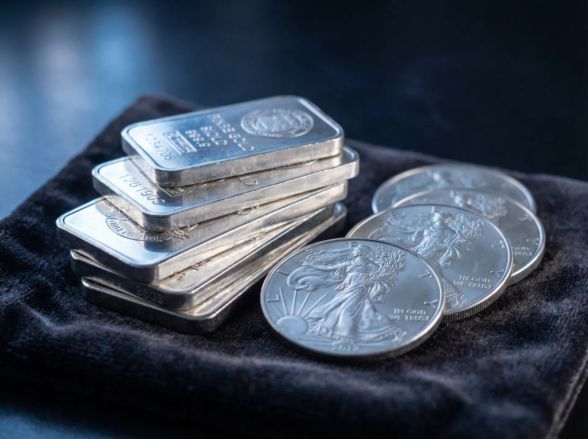 Silver bullion bars and coins