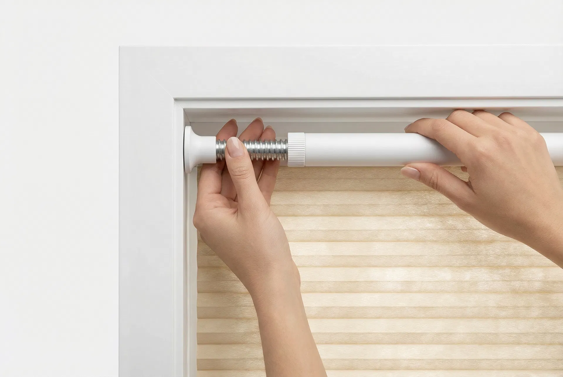 Step 1: Squeeze no-drill tension rod into apartment window frame — renter-friendly installation