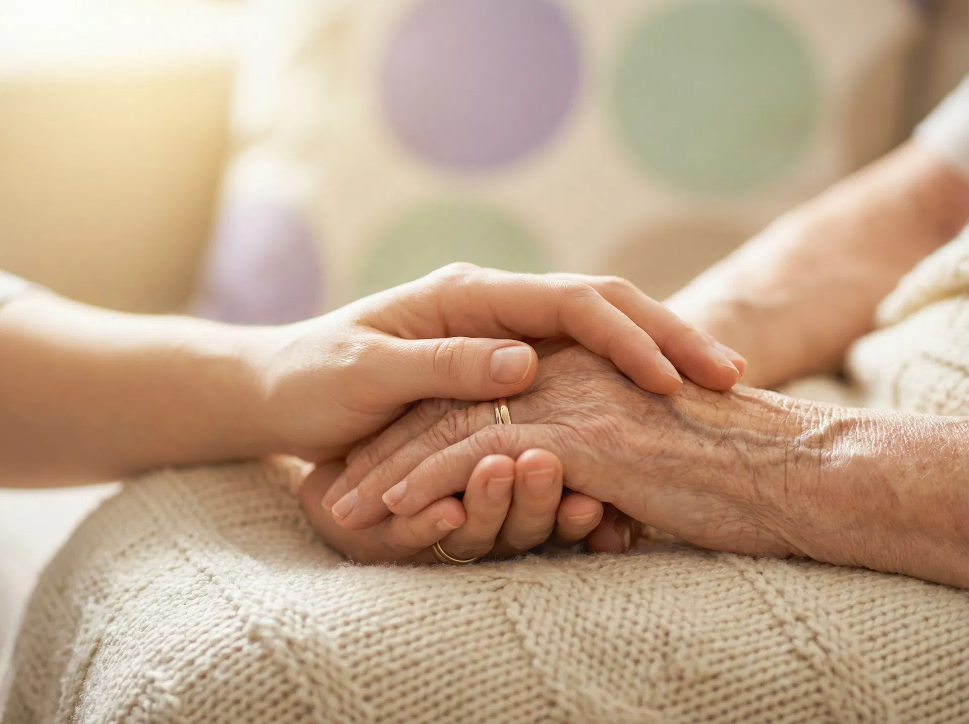 Compassionate hands holding