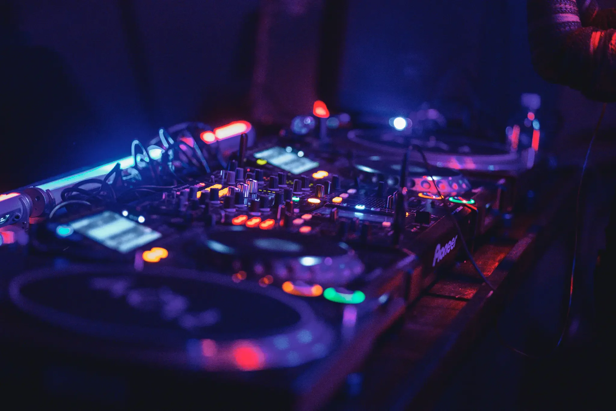 DJ equipment and neon lighting