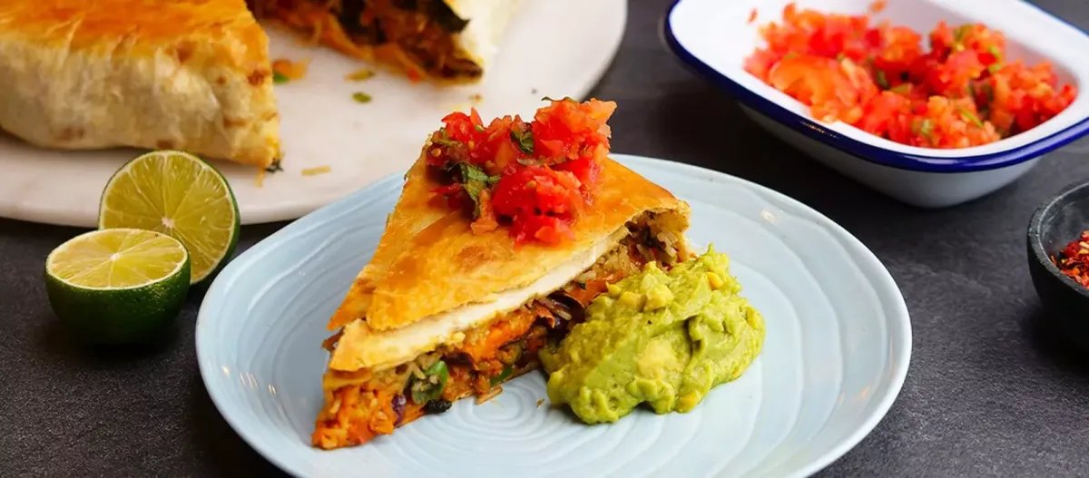 Giant Burrito Crunch Cake — a plant-based Mexican recipe by BOSH!