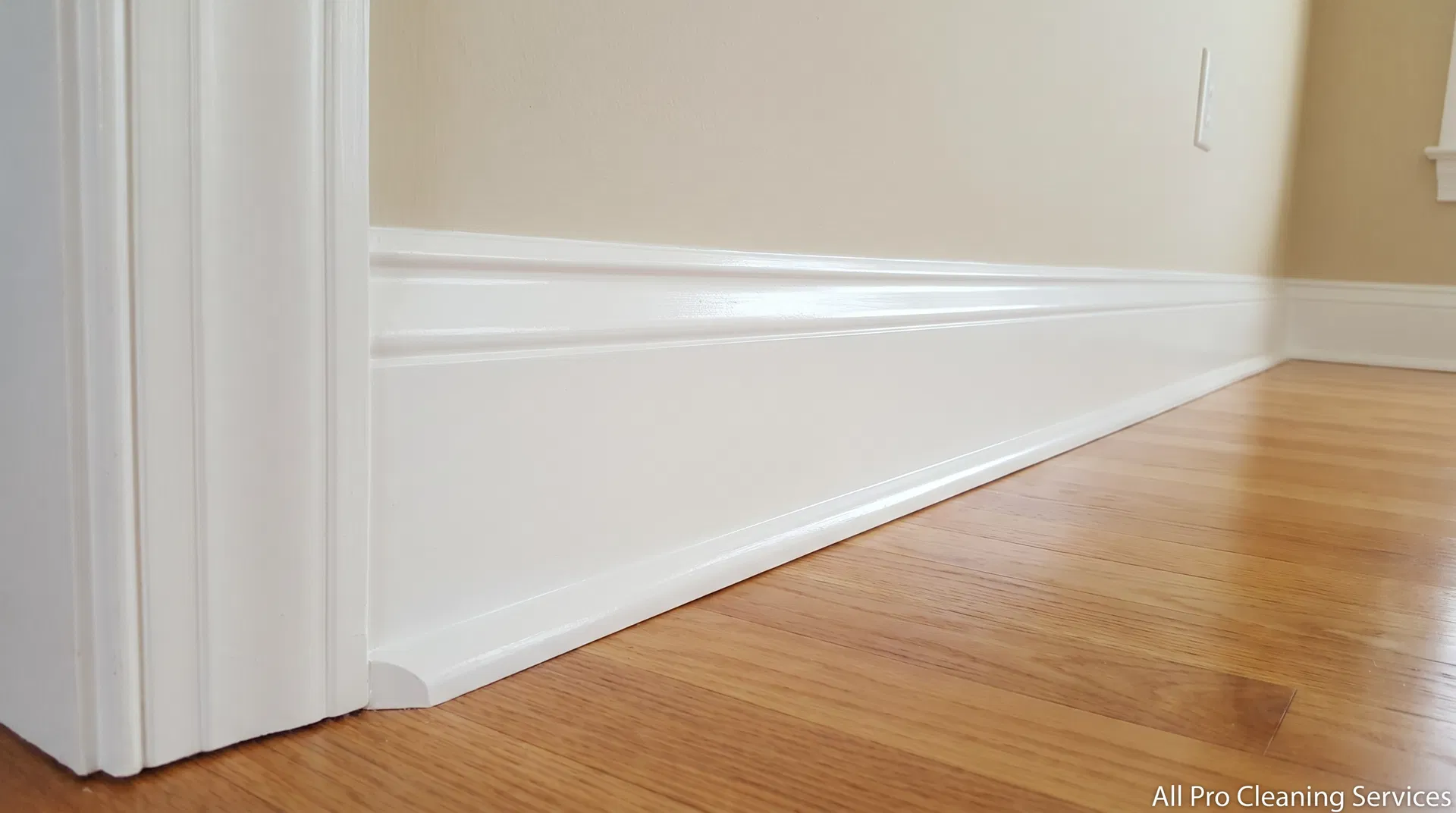 All Pro Cleaning Services - pristine white clean baseboards after deep cleaning - Hutchinson KS