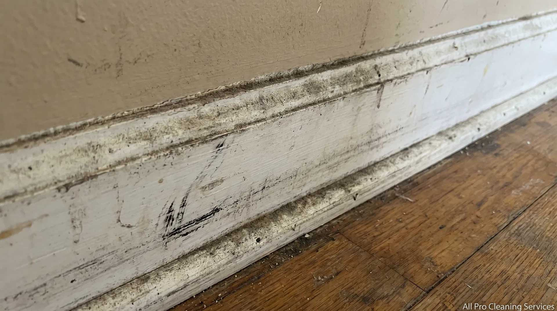 All Pro Cleaning Services - dirty grimy baseboards before deep cleaning - Hutchinson KS