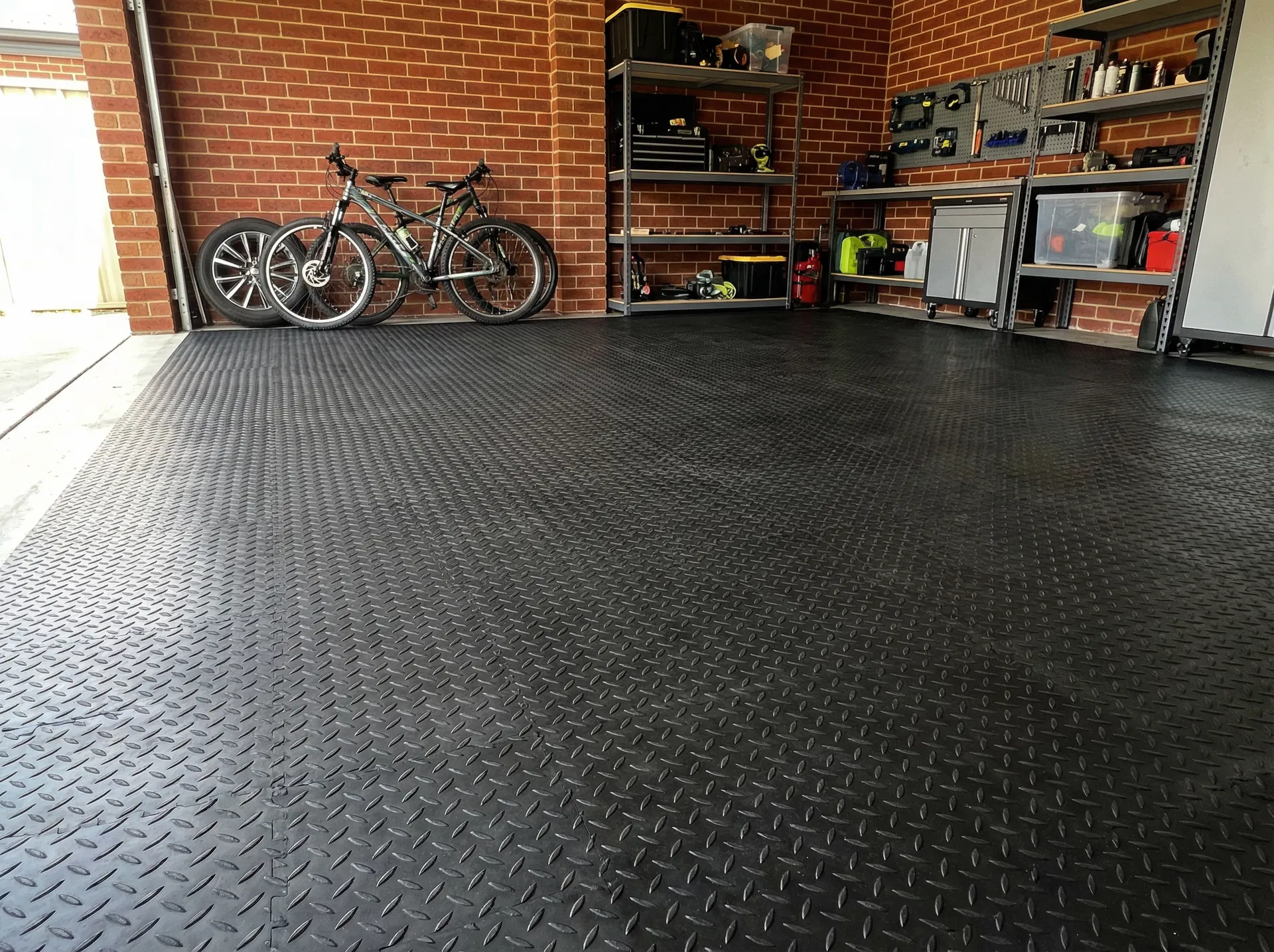 After: FDM rubber mats installed in garage