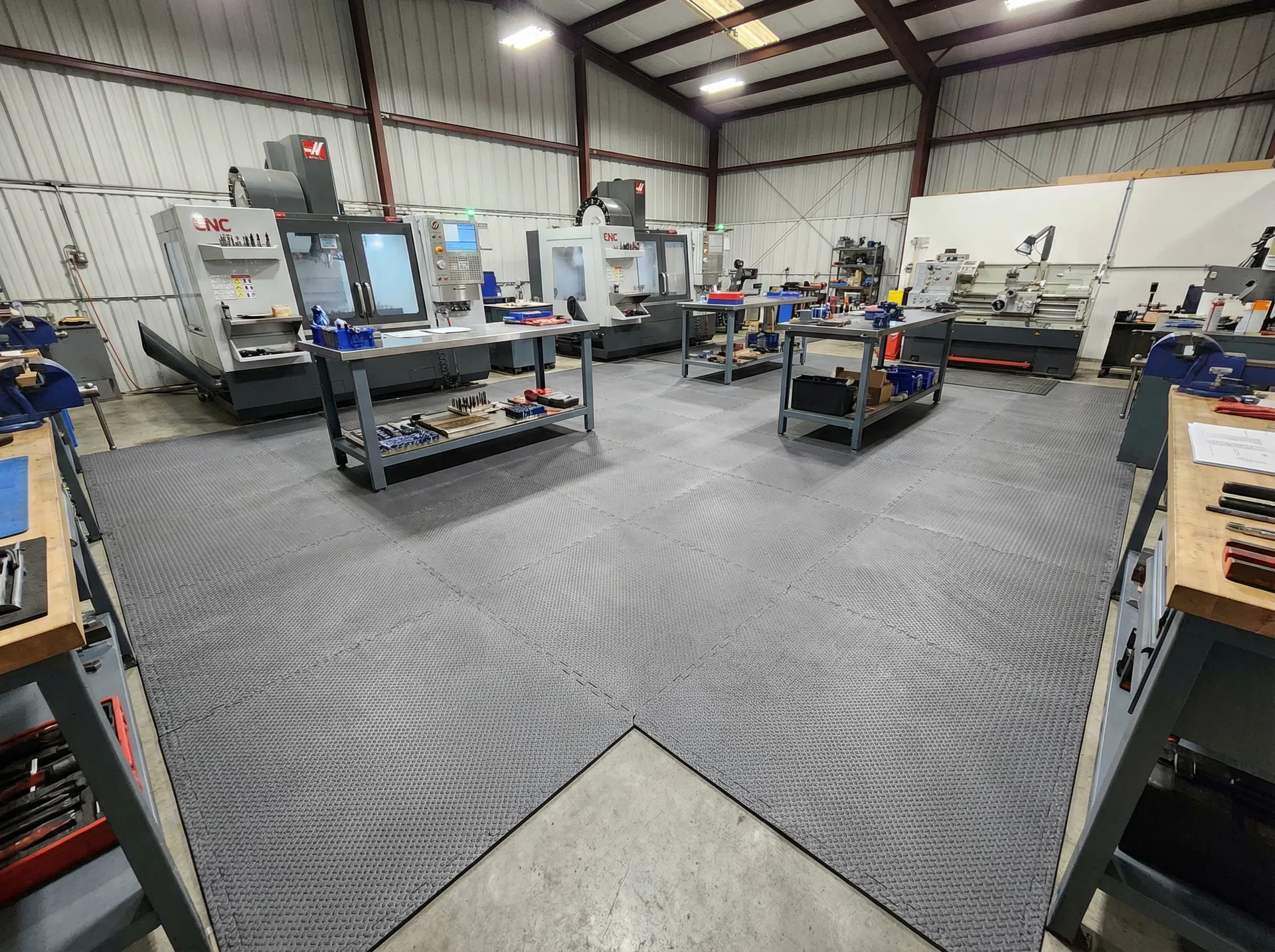 After: FDM mats installed in workshop