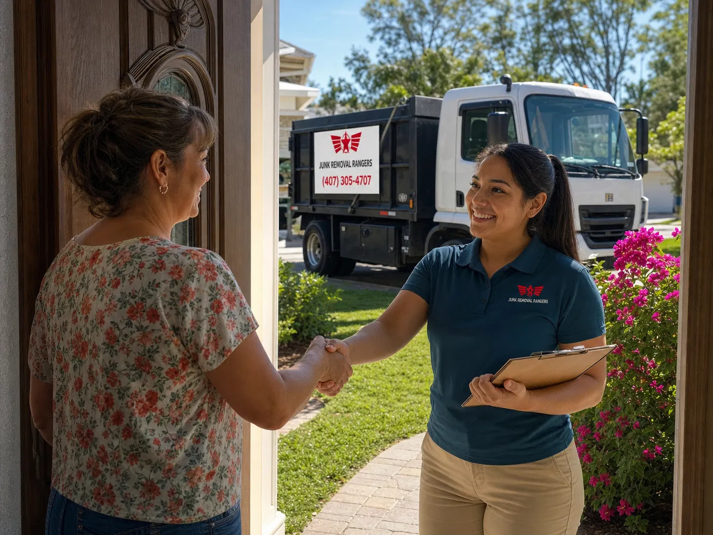 Junk Removal Rangers greeting a homeowner in Kissimmee, FL