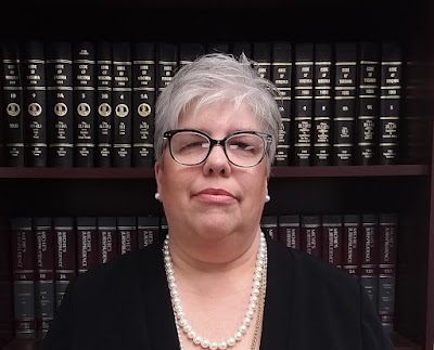 John W Lee, P.C.: Kim A. Lewis