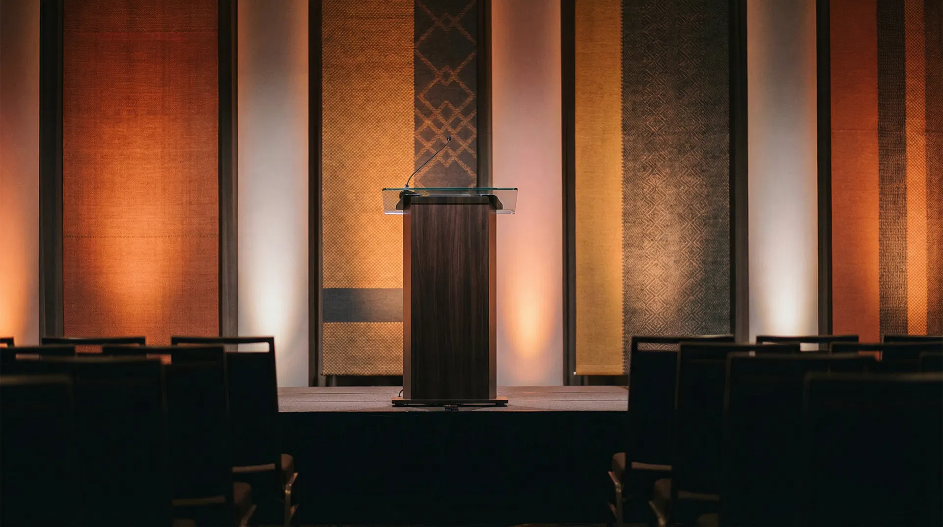 Conference speaking stage — corporate event setting
