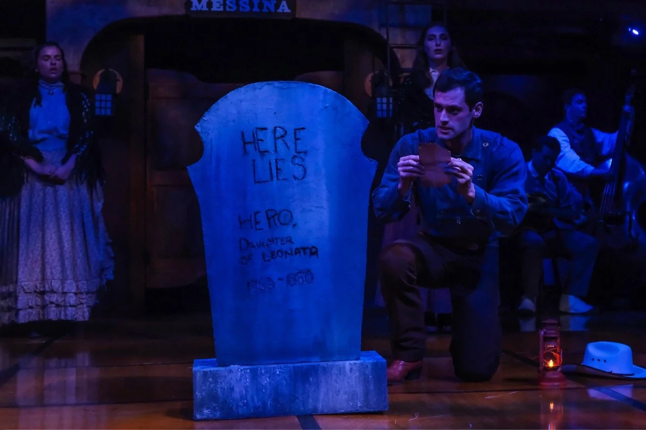 Much Ado About Nothing - Scenic design by Brandon PT Davis. A vibrant American Southwest setting with rustic elements and a stage for live bluegrass music, evoking a lively atmosphere.