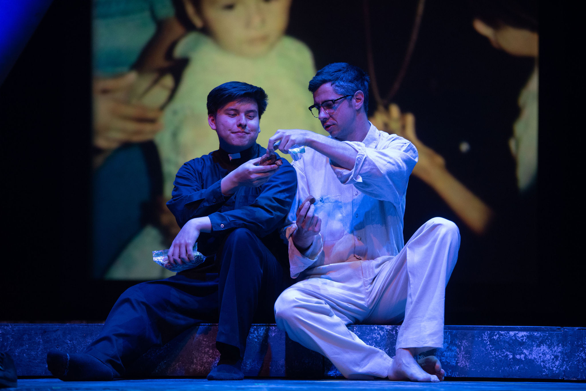 Romero - Scenic design by Brandon PT Davis. Dramatic set, evocative of historical context, with strong thematic elements.