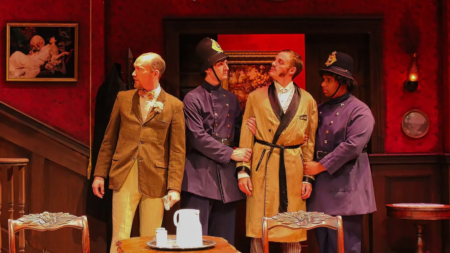 Angel Street - Scenic design by Brandon PT Davis. Dimly lit Victorian parlor with heavy drapes and gaslight, creating a suspenseful atmosphere for a classic thriller.