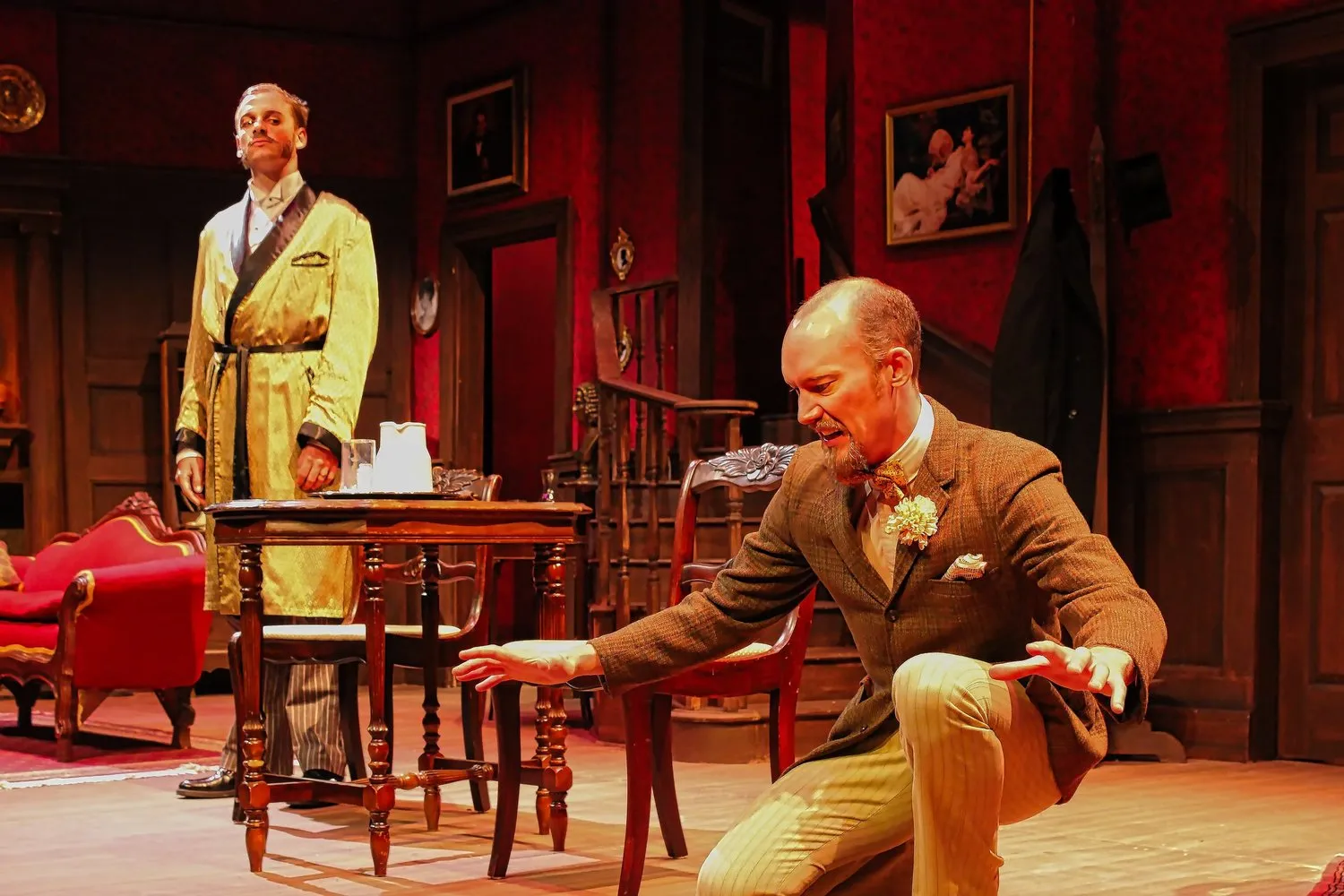 Angel Street - Scenic design by Brandon PT Davis. Victorian drawing-room, dim gaslight, and heavy shadows create a suspenseful atmosphere.