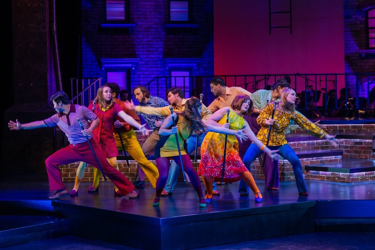 Company - Scenic design by Brandon PT Davis. Dynamic urban setting with modular structures, reflecting the complexities of relationships in vibrant New York City.