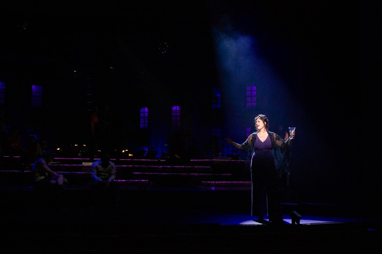 Company - Scenic design by Brandon PT Davis. Modern New York City apartment set, sleek lines, and dynamic lighting reflecting urban relationships.