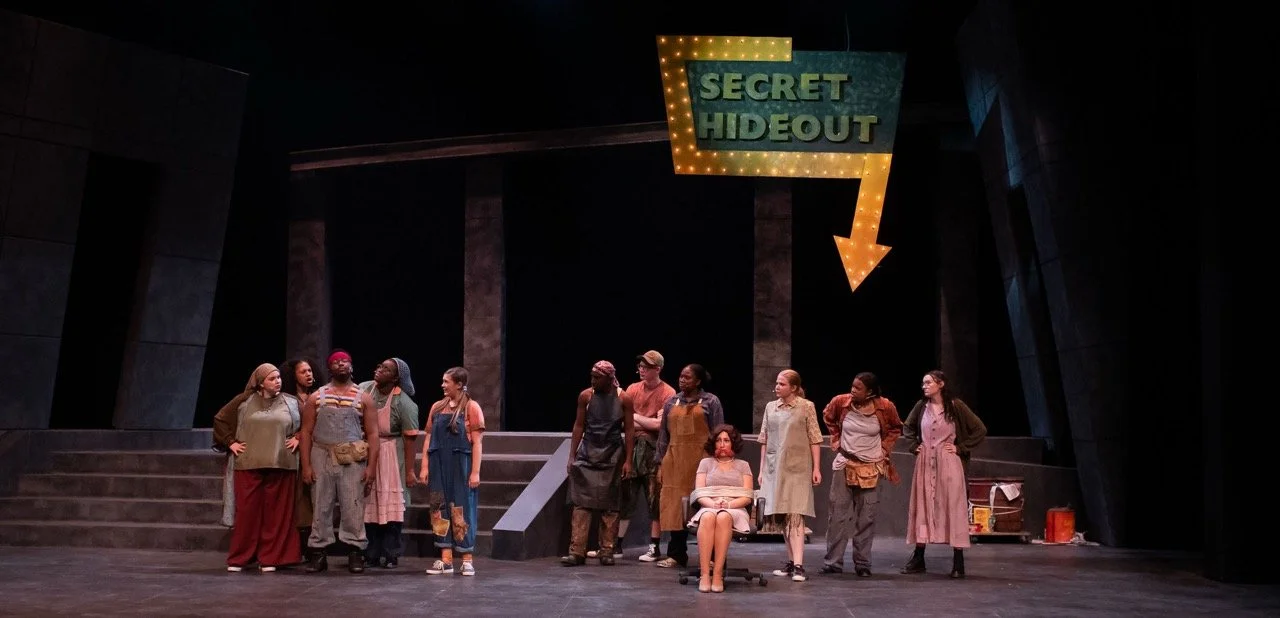 Urinetown - Scenic design by Brandon PT Davis. Industrial, multi-level set with stark, muted colors, suggesting a water-deprived, oppressive urban landscape.