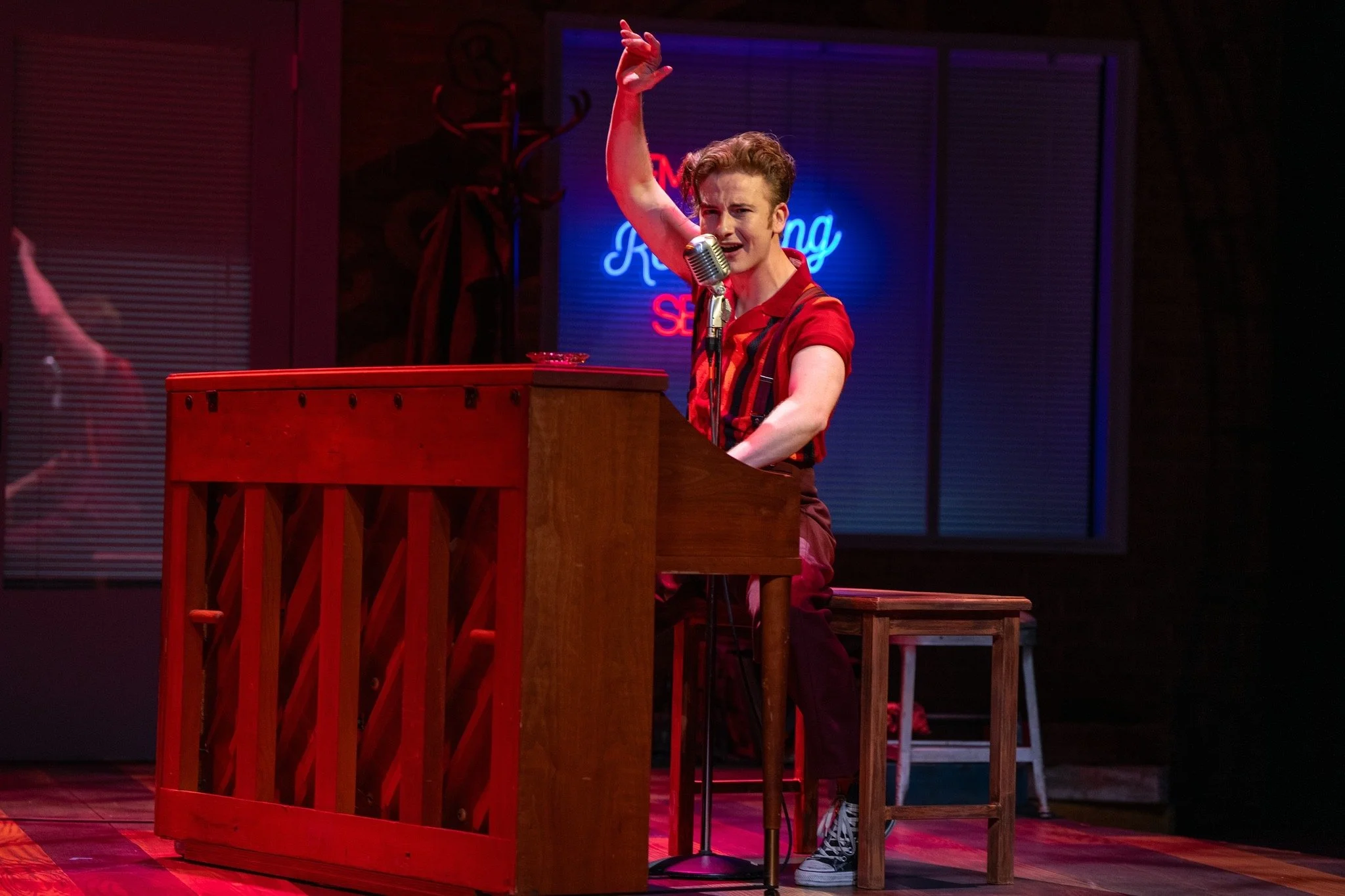 Million Dollar Quartet - Scenic design by Brandon PT Davis. A vibrant 1950s recording studio set with vintage microphones, instruments, and warm lighting, capturing the legendary Sun Records session.