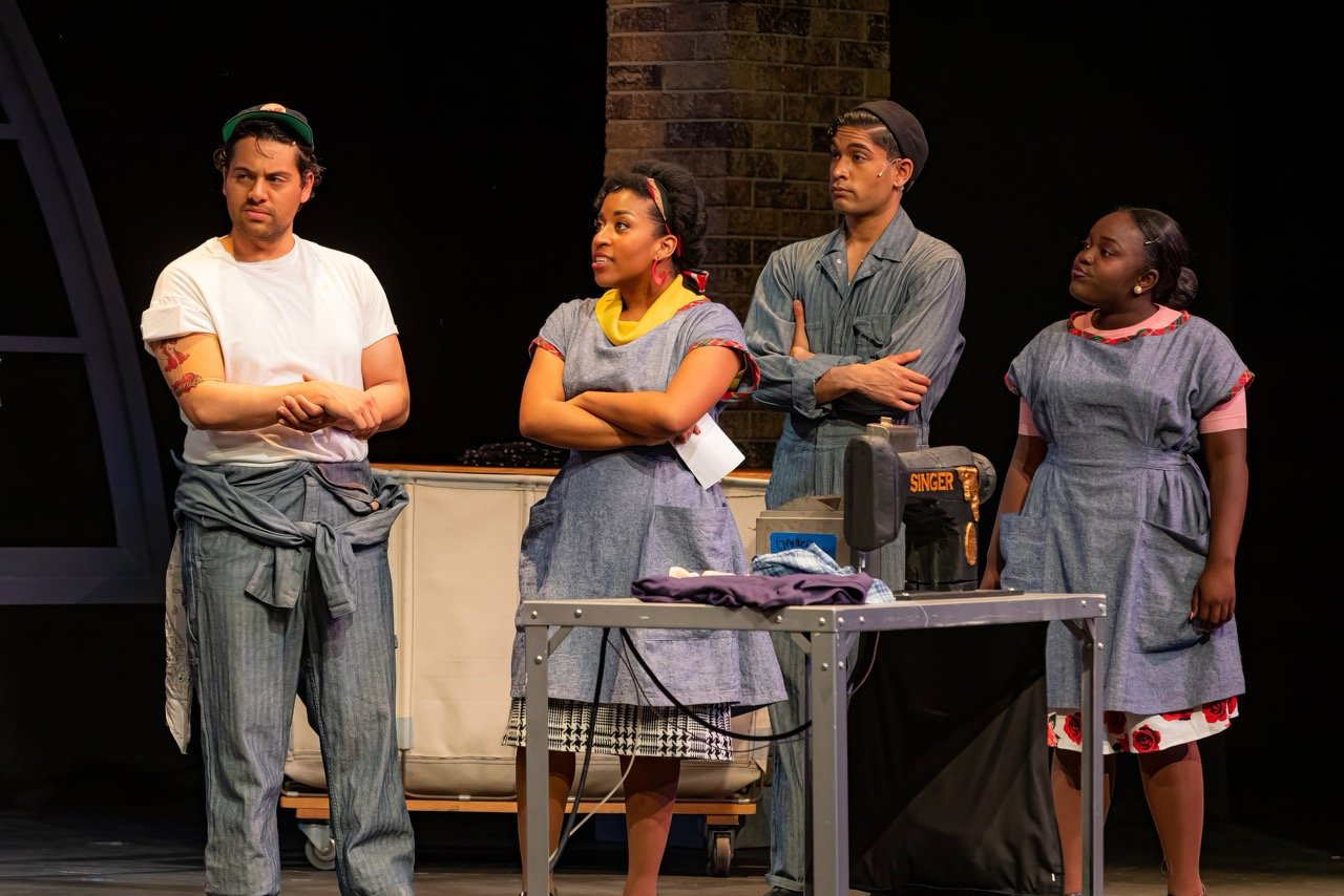 The Pajama Game - Scenic design by Brandon PT Davis. Vibrant 1950s pajama factory setting with industrial elements, bright colors, and a lively atmosphere.