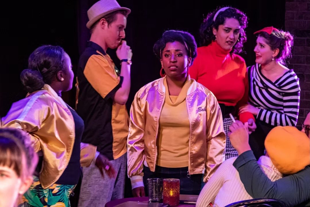 The Pajama Game - Scenic design by Brandon PT Davis. Vibrant 1950s factory setting with bright colors, dynamic machinery, and playful elements reflecting labor and romance.