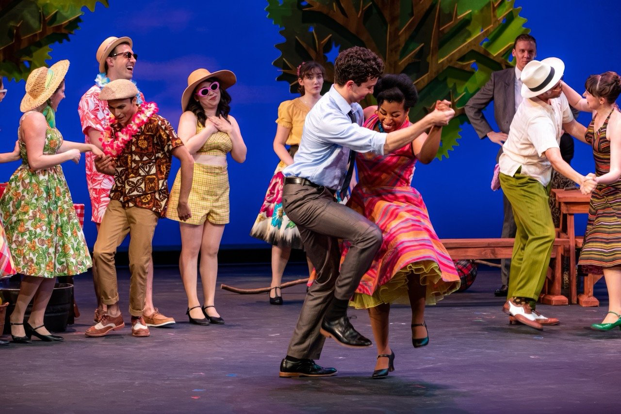 The Pajama Game - Scenic design by Brandon PT Davis. Energetic 1950s factory setting with industrial machinery, bright colors, and dynamic lighting.