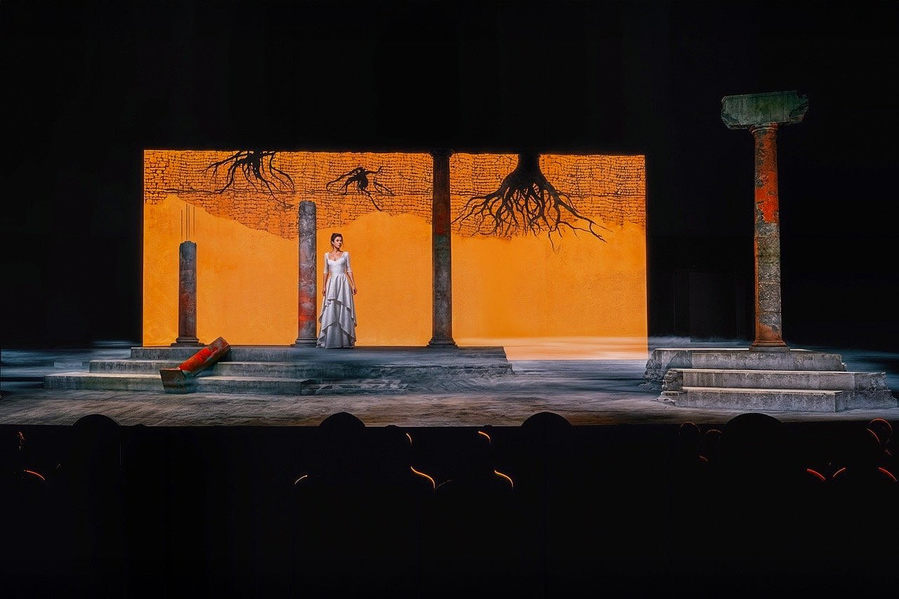 The Penelopiad - Scenic design by Brandon PT Davis. Abstract set with flowing fabrics and cool lighting, evoking Penelope's journey and emotional landscape.