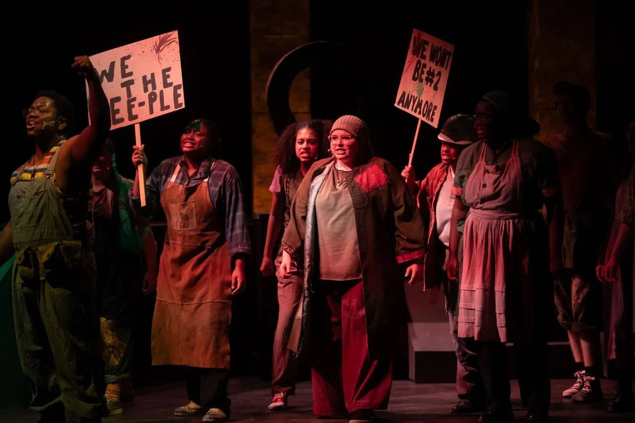 Urinetown - Scenic design by Brandon PT Davis. Gritty, industrial set with towering pipes and muted colors, evoking a desperate, water-scarce society.