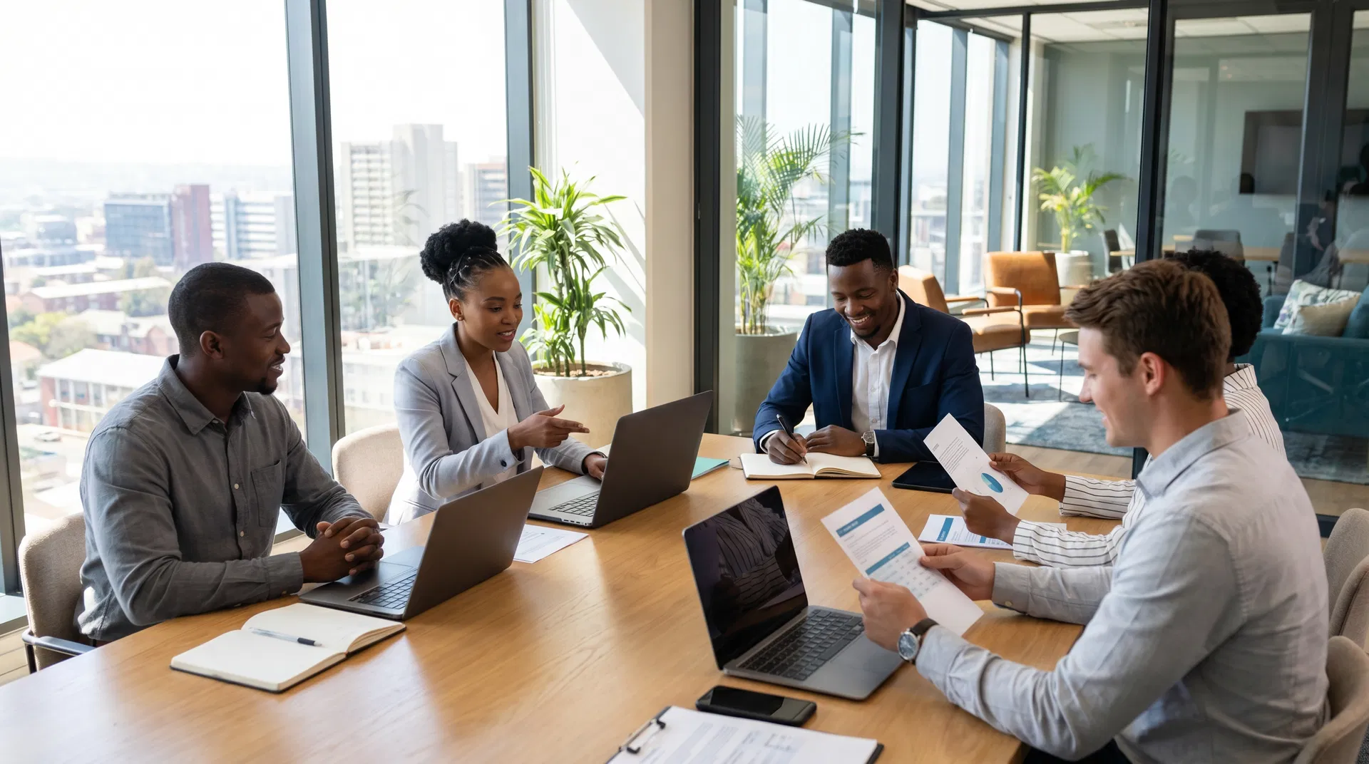 Qhayiyah Group team collaborating