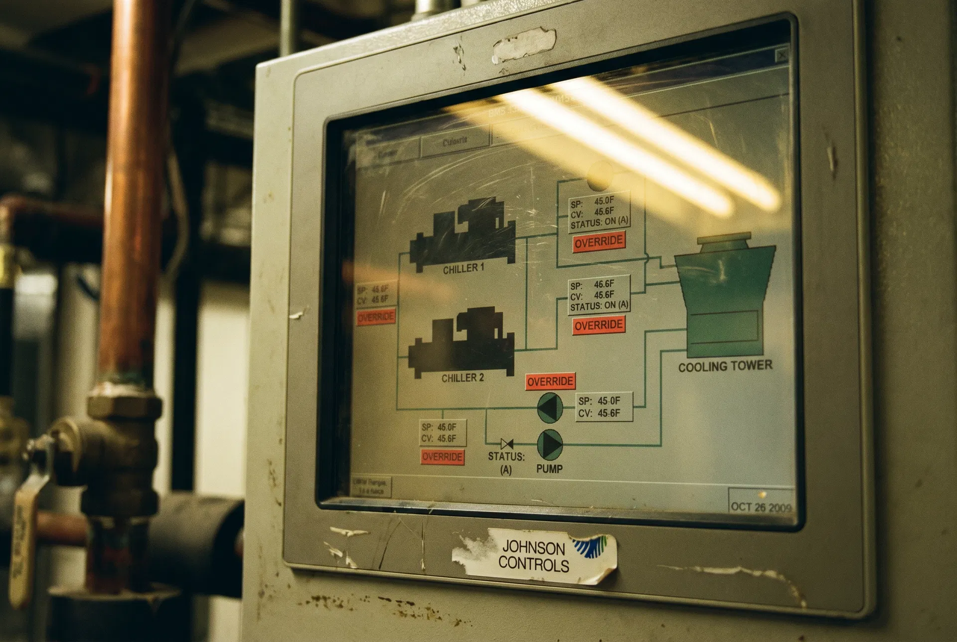 An older NYC BMS panel showing multiple active OVERRIDE indicators.