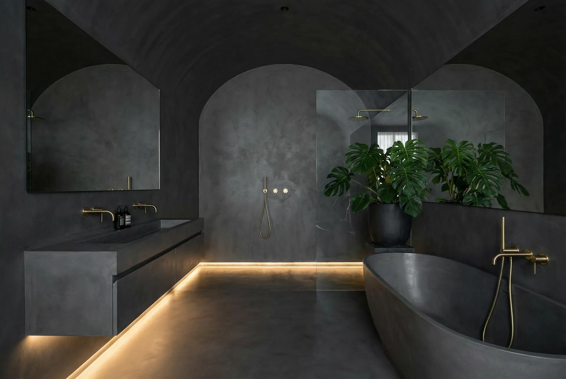 All-over charcoal microcement bathroom with gold tapware Gold Coast