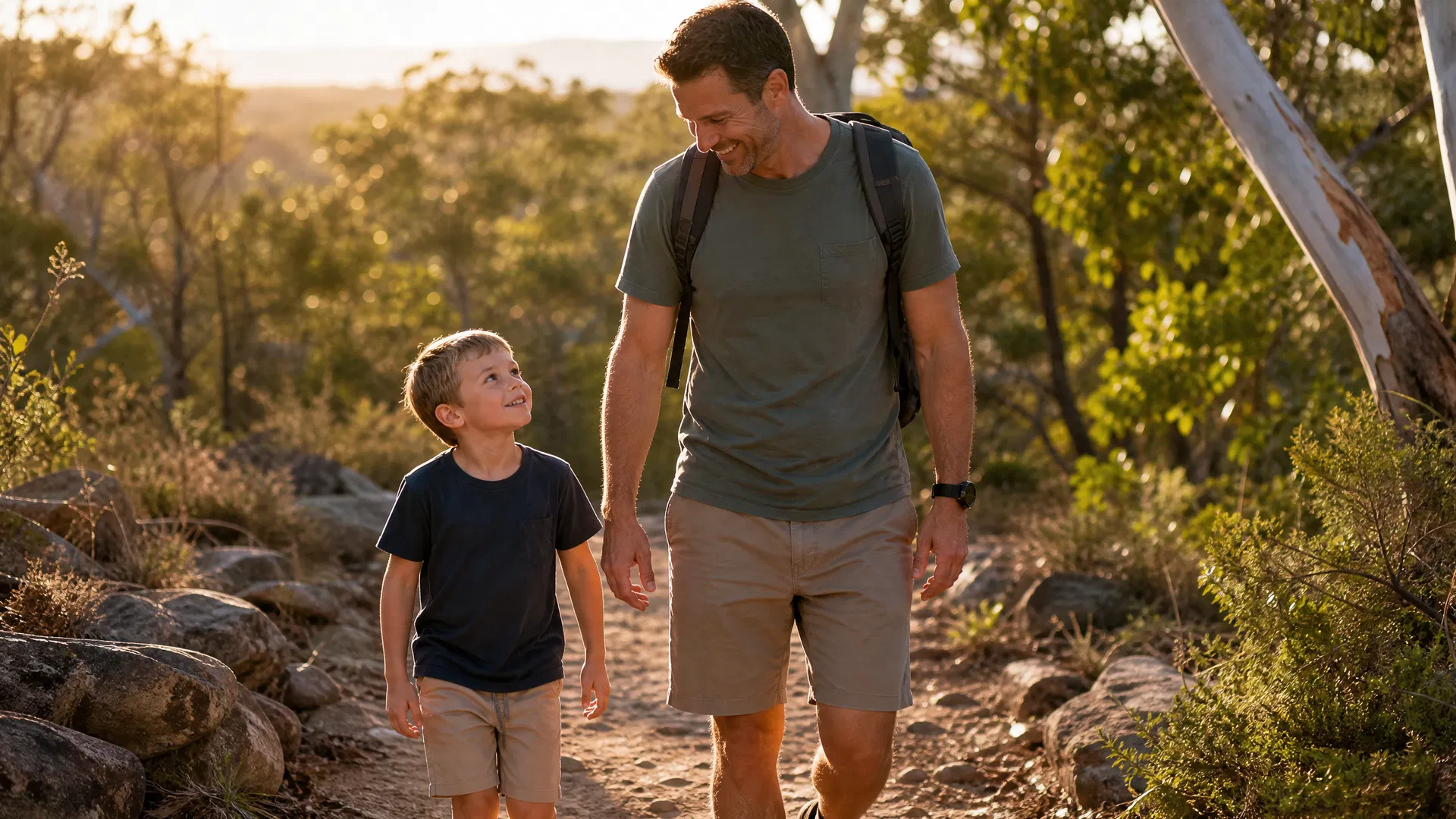 Parent and child walking together in an Australian park