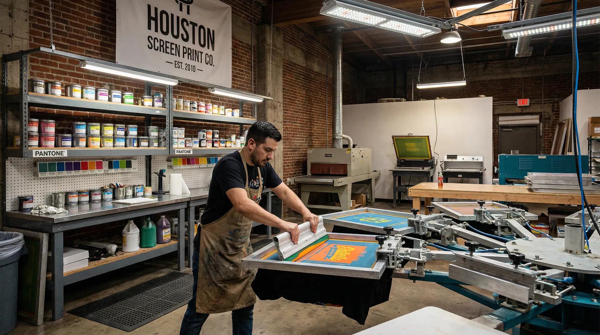 Screen printing press in action