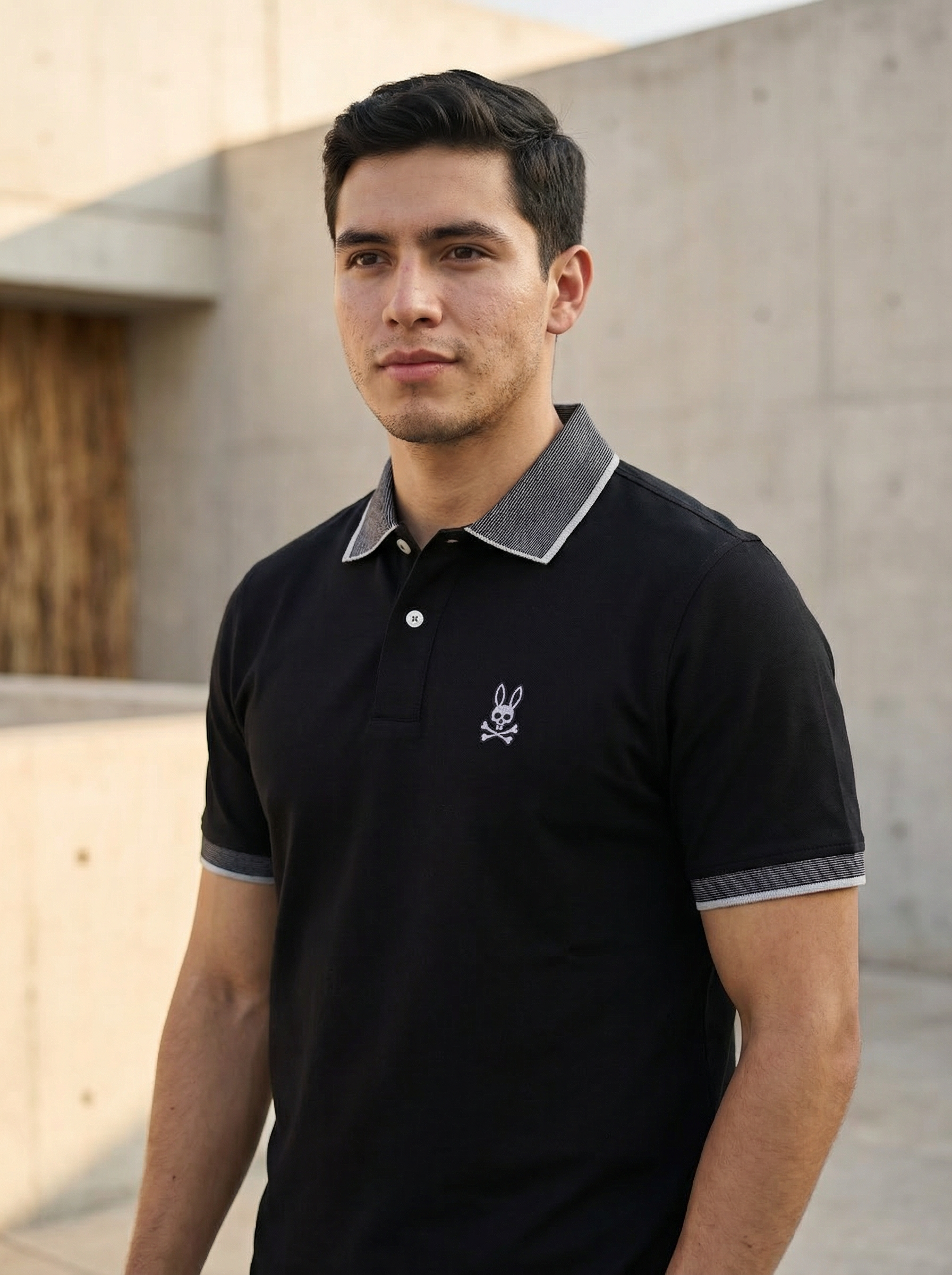 Polo Psycho Bunny Negro con Detalles Rayados
