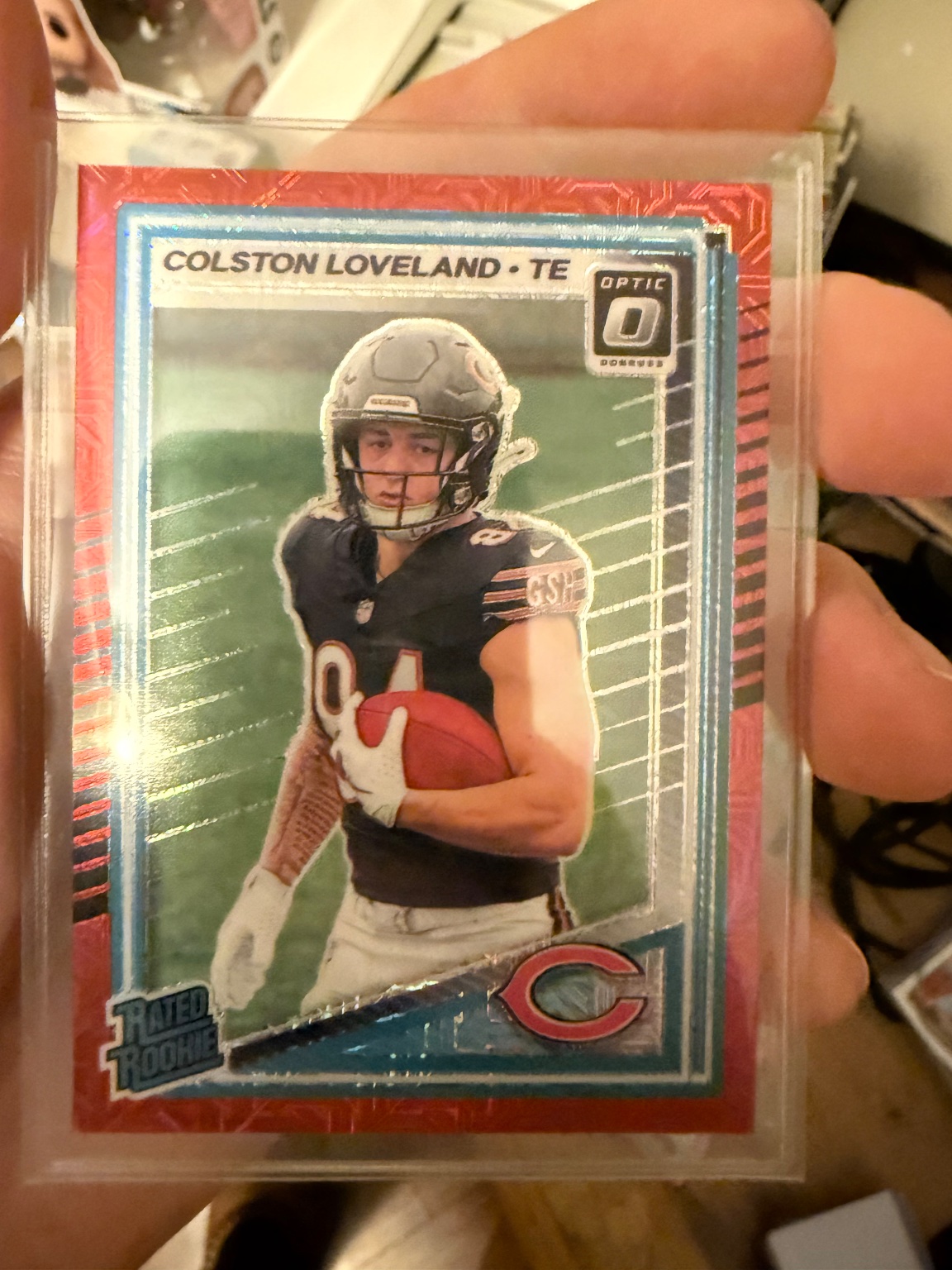 Colston Loveland - Rated Rookie Red Ice Prizm Red Ice Prizm - Trading Card Image