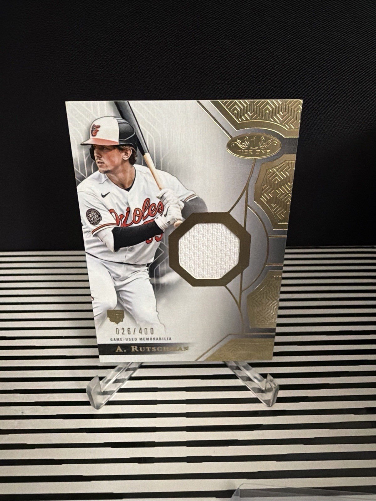 Adley Rutschman 2023 Topps Tier One Game-Used Memorabilia Patch /400 Game-Used Memorabilia Patch - Trading Card Image