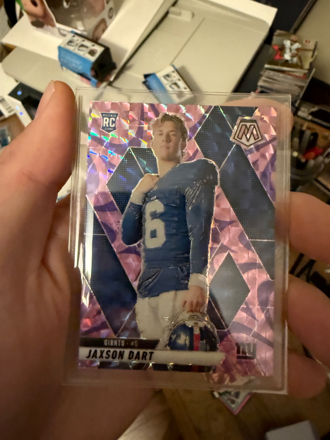 Jaxson Dart 2022 Panini Mosaic Pink Fluorescent Prizm Rookie Card Silver Prizm - Trading Card Image