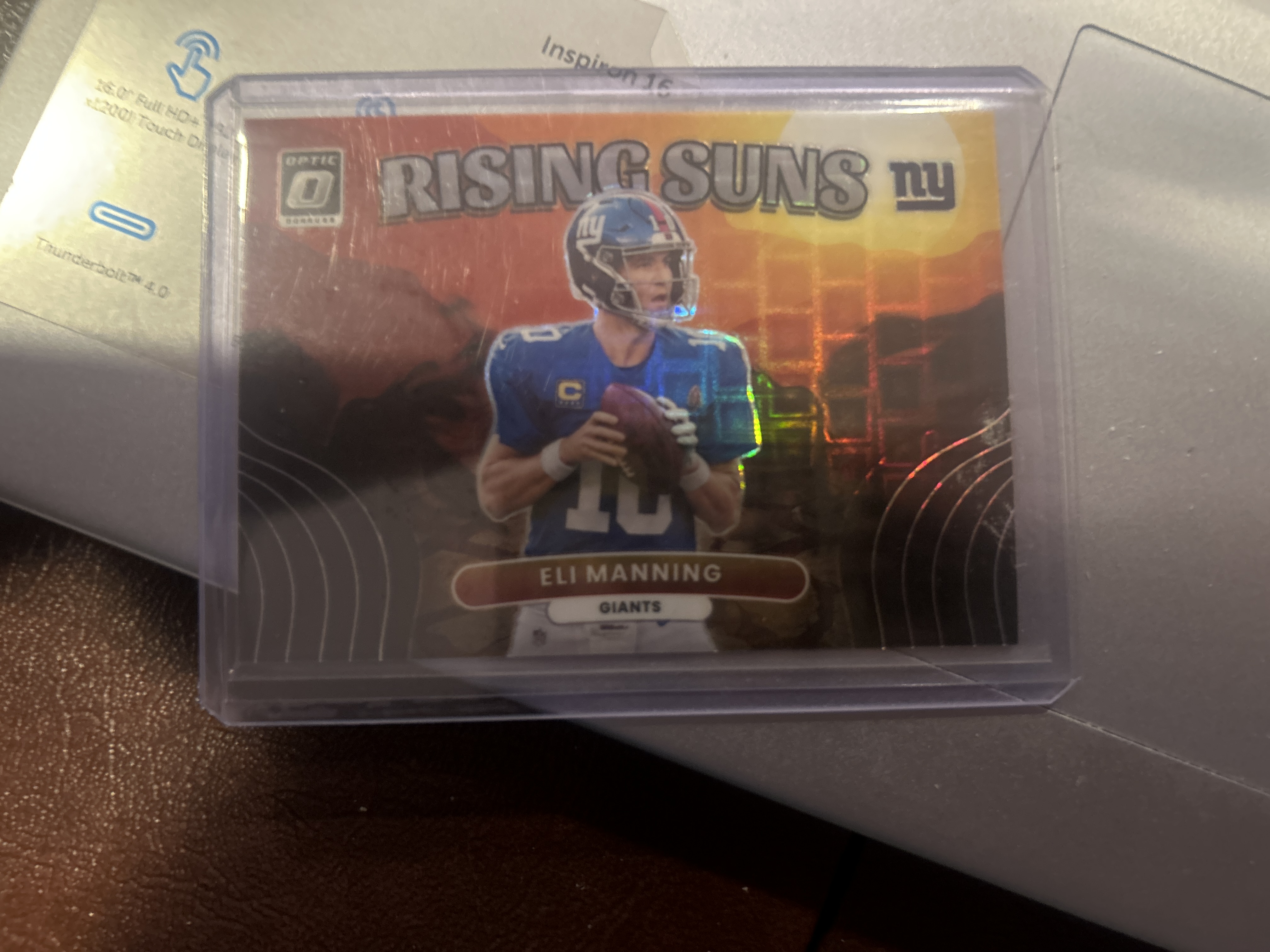 Eli Manning - Rising Suns Insert Rising Suns Insert Orange /25 - Trading Card Image
