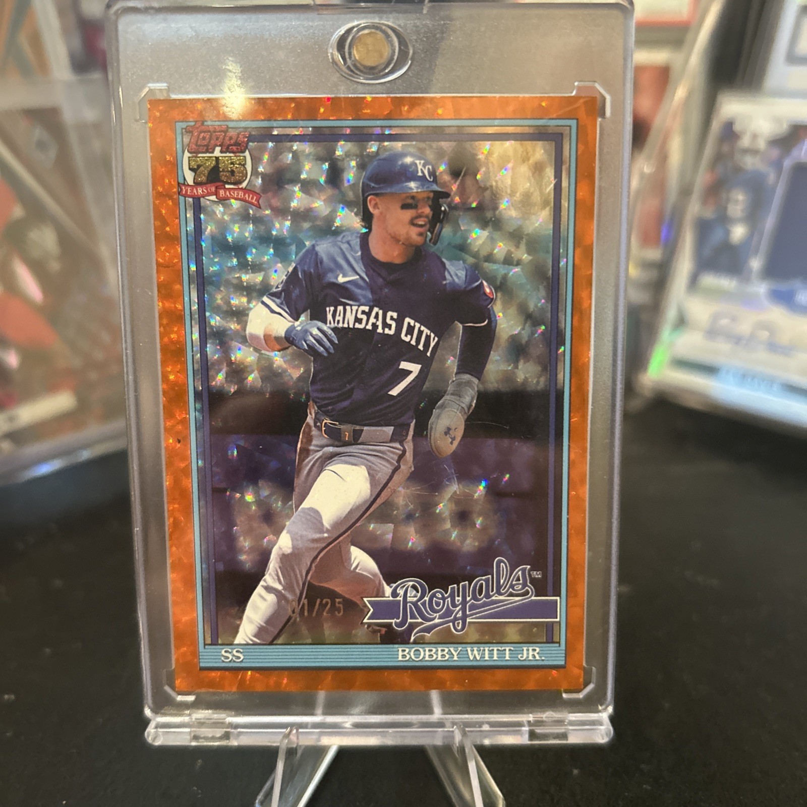 Bobby Witt Jr. 2024 Topps Orange Cracked Ice Rainbow Foil /25 Orange Cracked Ice Rainbow Foil /25 - Trading Card Image